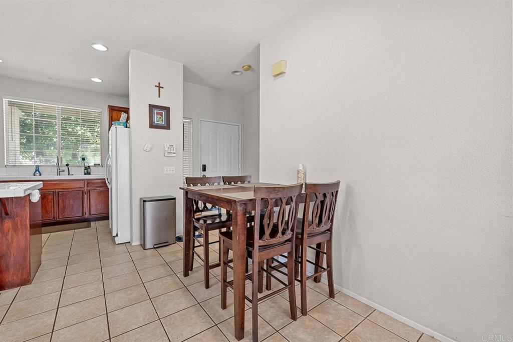 832 Laffey Lane El Cajon, CA 92021 - Photo 10 of 47 a view of a dining room with furniture