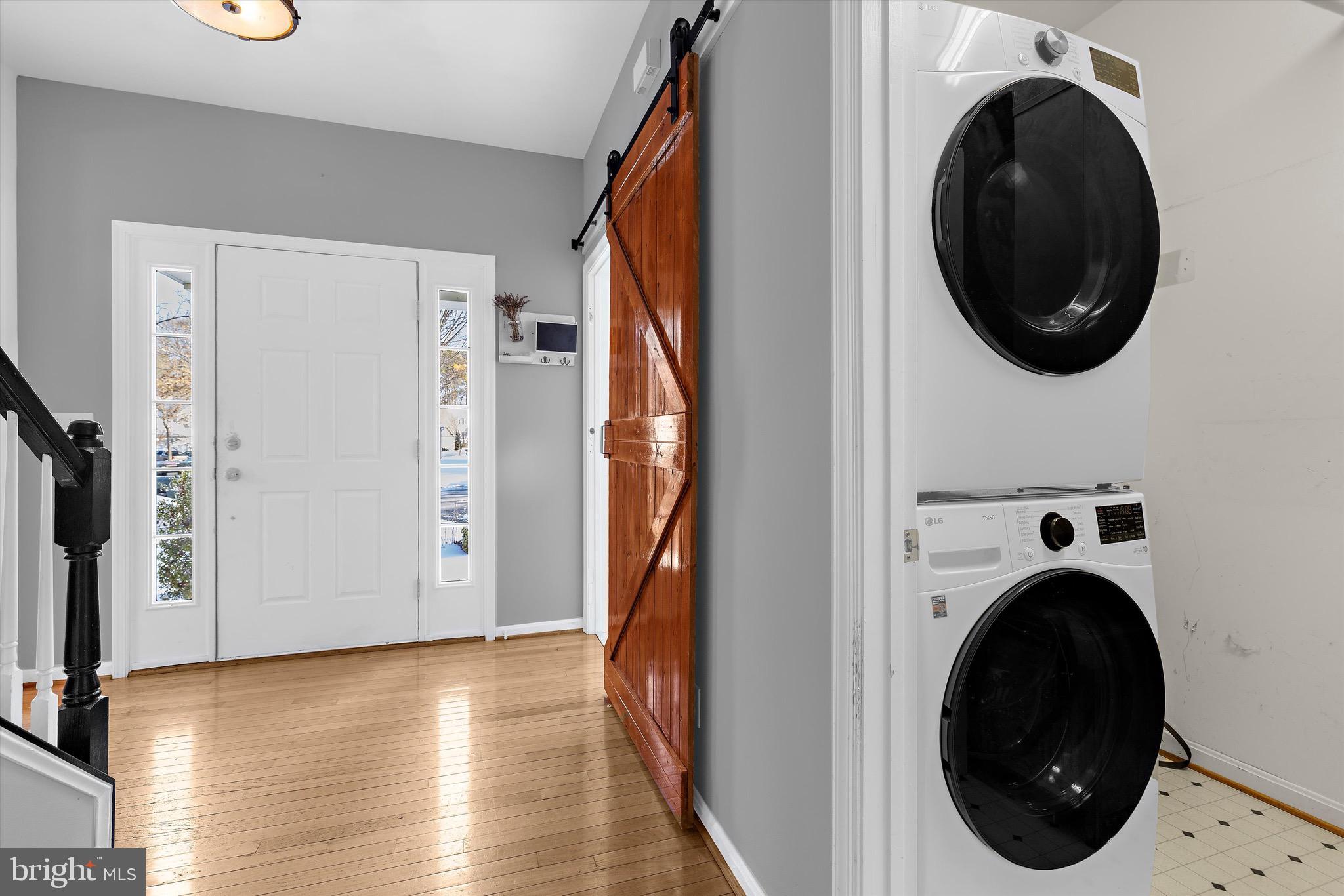 7144 Fir Street Easton, MD 21601 - Photo 13 of 24 a view of a hallway with washer and dryer