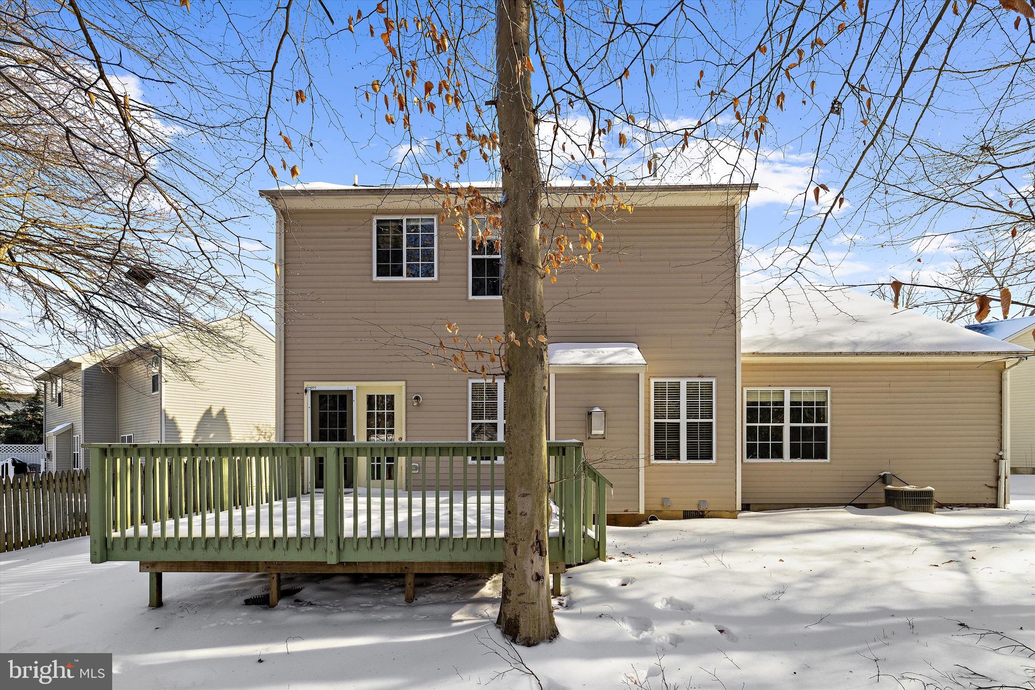 7144 Fir Street Easton, MD 21601 - Photo 9 of 24 a view of a house with a wooden deck