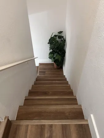 a view of a bathroom from a hallway
