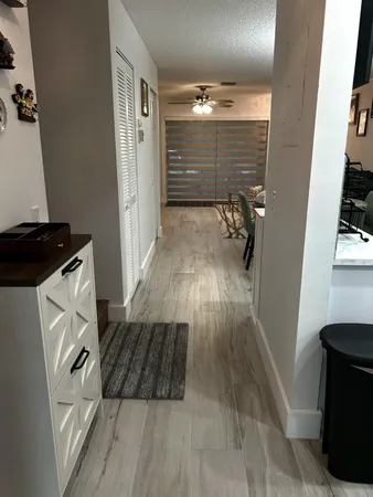 a view of a closet area with furniture