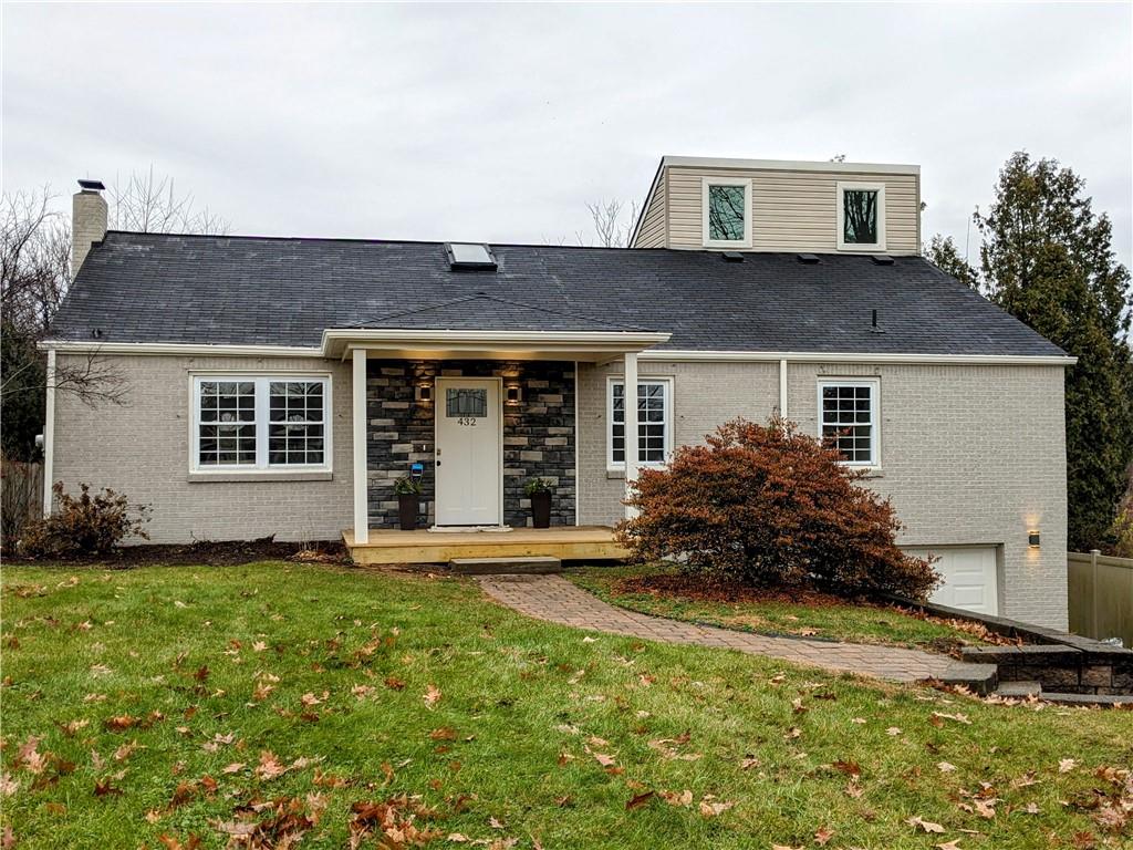 a house view with a garden space
