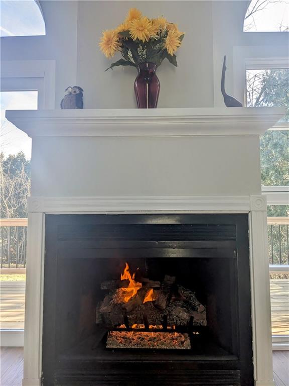 432 Raspberry Drive Monroeville, PA 15146 - Photo 16 of 39 a close view of a fireplace with wooden floor