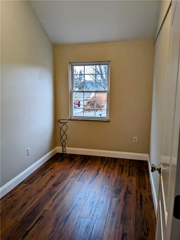 432 Raspberry Drive Monroeville, PA 15146 - Photo 23 of 39 an empty room with wooden floor and windows