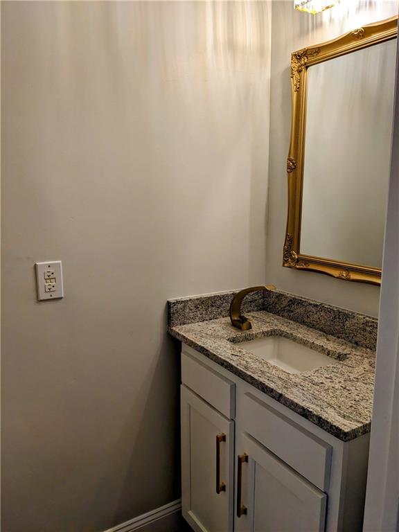 432 Raspberry Drive Monroeville, PA 15146 - Photo 26 of 39 a bathroom with a granite countertop sink and a mirror