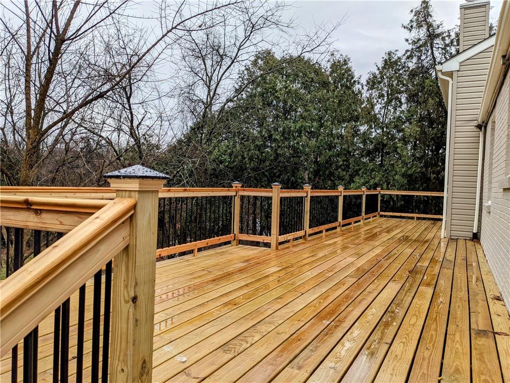 432 Raspberry Drive Monroeville, PA 15146 - Photo 33 of 39 a view of a balcony with wooden floor and fence