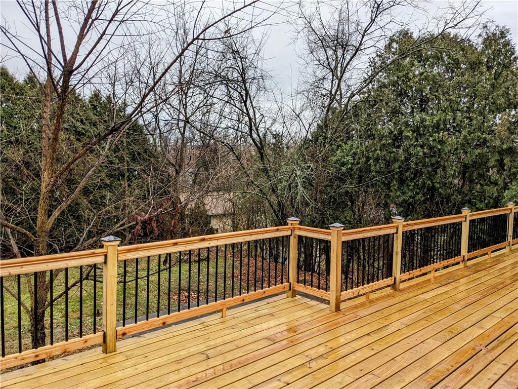 432 Raspberry Drive Monroeville, PA 15146 - Photo 34 of 39 a view of a balcony with wooden floor and fence