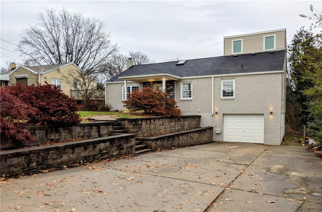 432 Raspberry Drive Monroeville, PA 15146 - Photo 5 of 39 a front view of a house with a yard