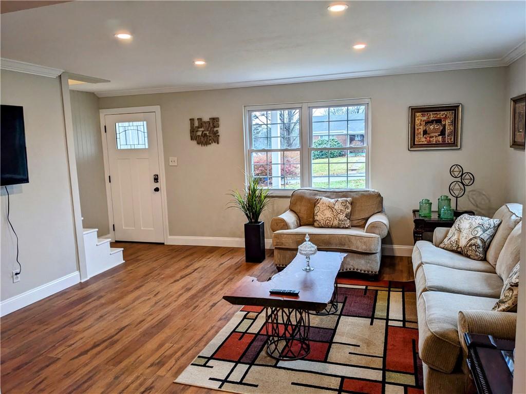 432 Raspberry Drive Monroeville, PA 15146 - Photo 6 of 39 a living room with furniture and wooden floor