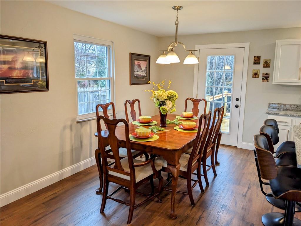 432 Raspberry Drive Monroeville, PA 15146 - Photo 8 of 39 a view of a dining room with furniture window and wooden floor