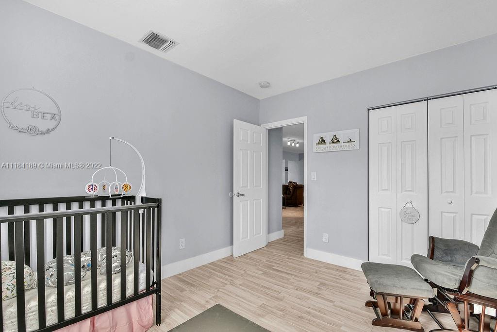 331 Northwest 144th Street Miami, FL 33168 - Photo 11 of 35 a view of livingroom with furniture and wooden floor