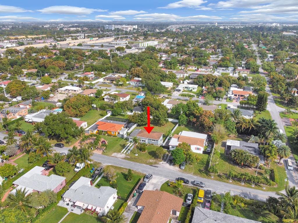 331 Northwest 144th Street Miami, FL 33168 - Photo 7 of 35 an aerial view of residential houses with city view