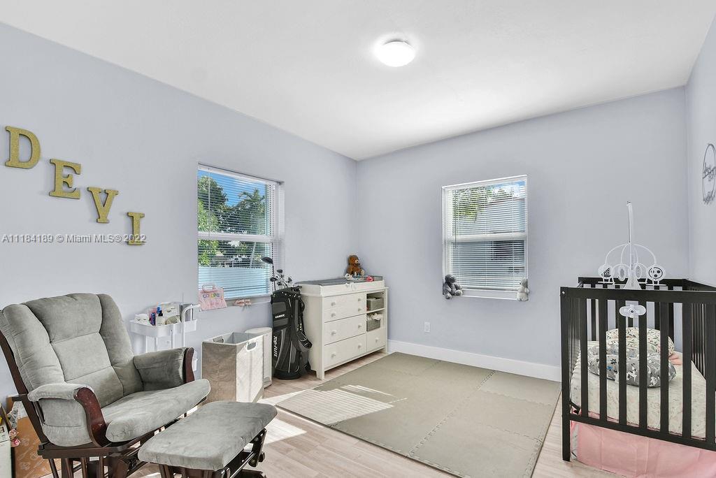 331 Northwest 144th Street Miami, FL 33168 - Photo 10 of 35 a living room with furniture