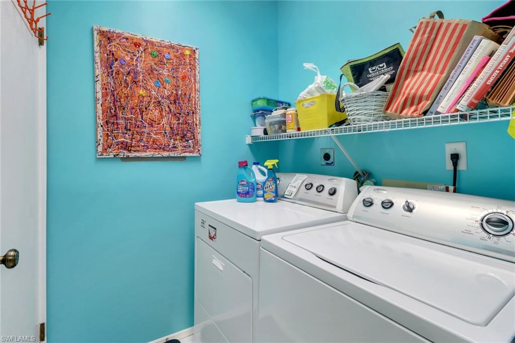110 Siena Way, Unit 206 Naples, FL 34119 - Photo 14 of 35 a utility room with dryer and washer