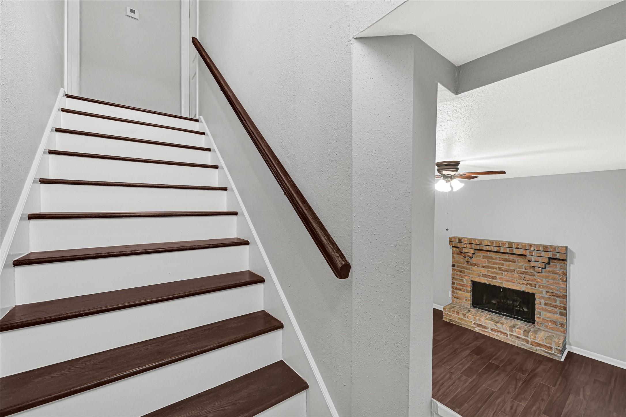 2425 Augusta Drive, Unit 29 Houston, TX 77057 - Photo 17 of 30 a view of entryway with wooden floor and a front door