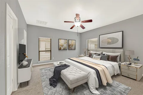 an empty room with chandelier fan