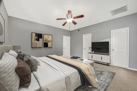 a bathroom with a granite countertop toilet a sink and bathtub