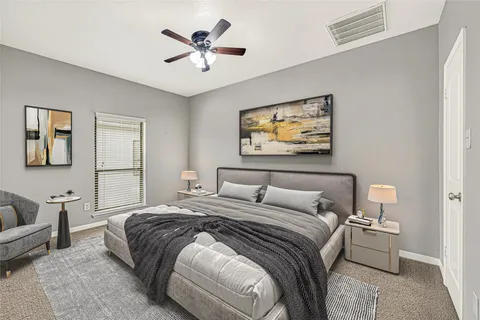 a view of a house with a backyard of a house