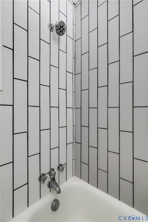 2815 Caniff Road Richmond, VA 23223 - Photo 17 of 39 a bathroom with a sink and a shower