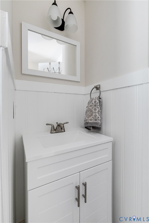 2815 Caniff Road Richmond, VA 23223 - Photo 18 of 39 a bathroom with a sink and a mirror