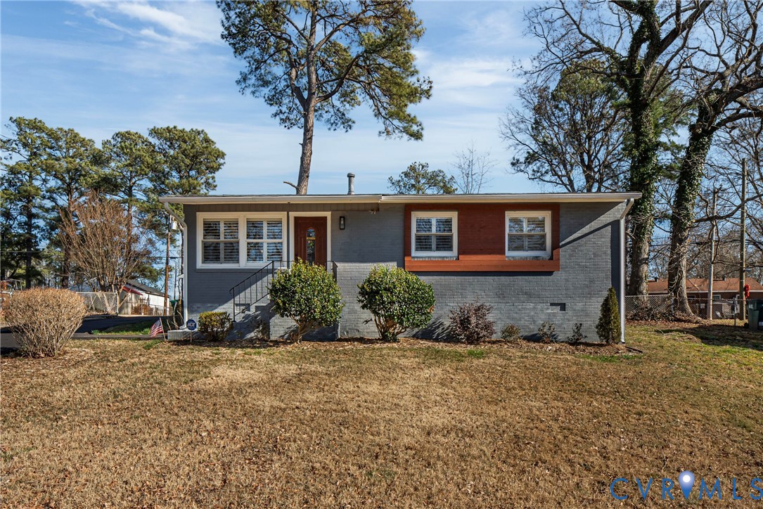 2815 Caniff Road Richmond, VA 23223 - Photo 2 of 39 front view of a house with a yard
