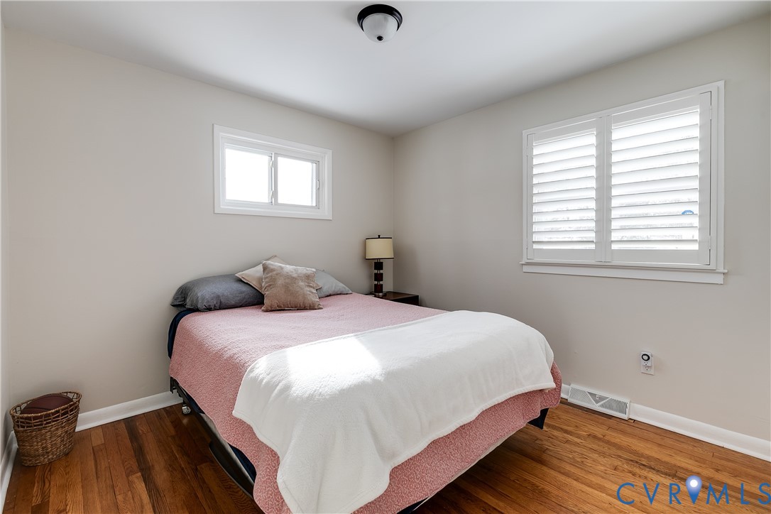2815 Caniff Road Richmond, VA 23223 - Photo 34 of 39 a bedroom with a bed and a window