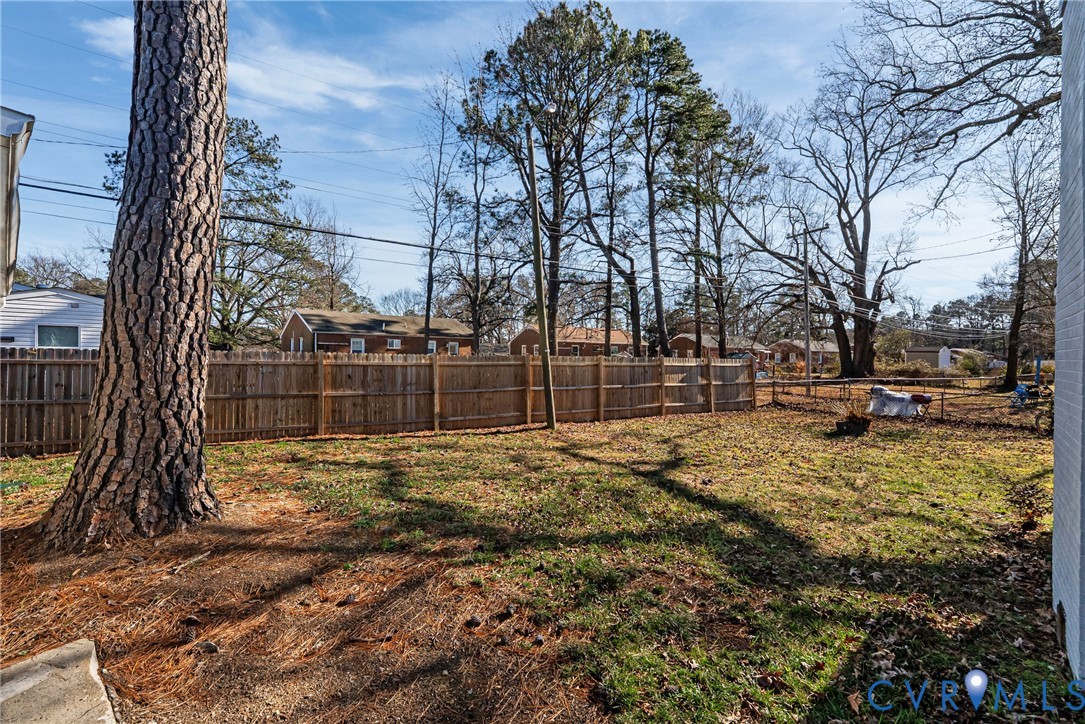 2815 Caniff Road Richmond, VA 23223 - Photo 37 of 39 a view of yard with tree