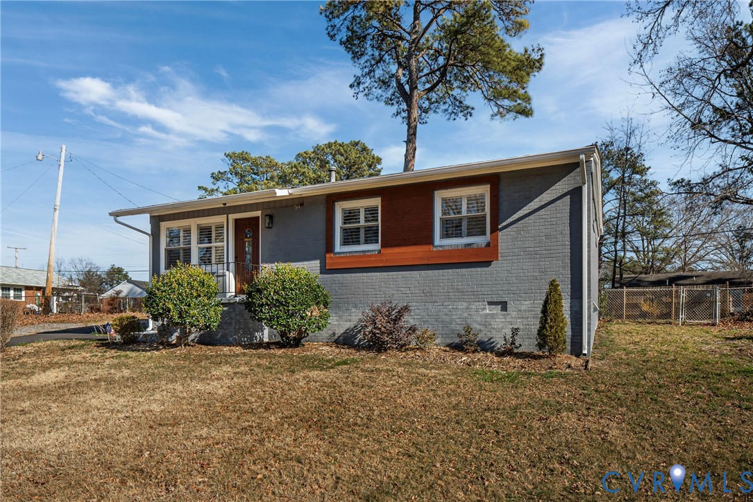 2815 Caniff Road Richmond, VA 23223 - Photo 39 of 39 front view of a house with a yard