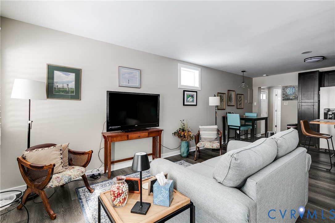 2815 Caniff Road Richmond, VA 23223 - Photo 5 of 39 a living room with furniture and a flat screen tv