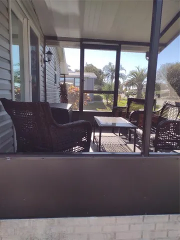 a living room with large window