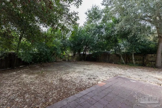 a view of backyard with green space