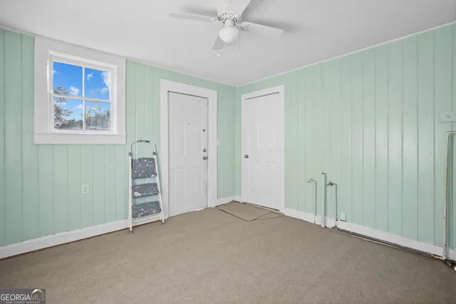 an empty room with windows