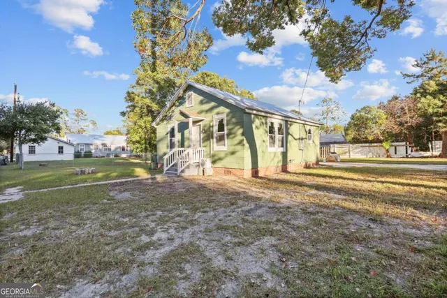 a view of yard with tree s
