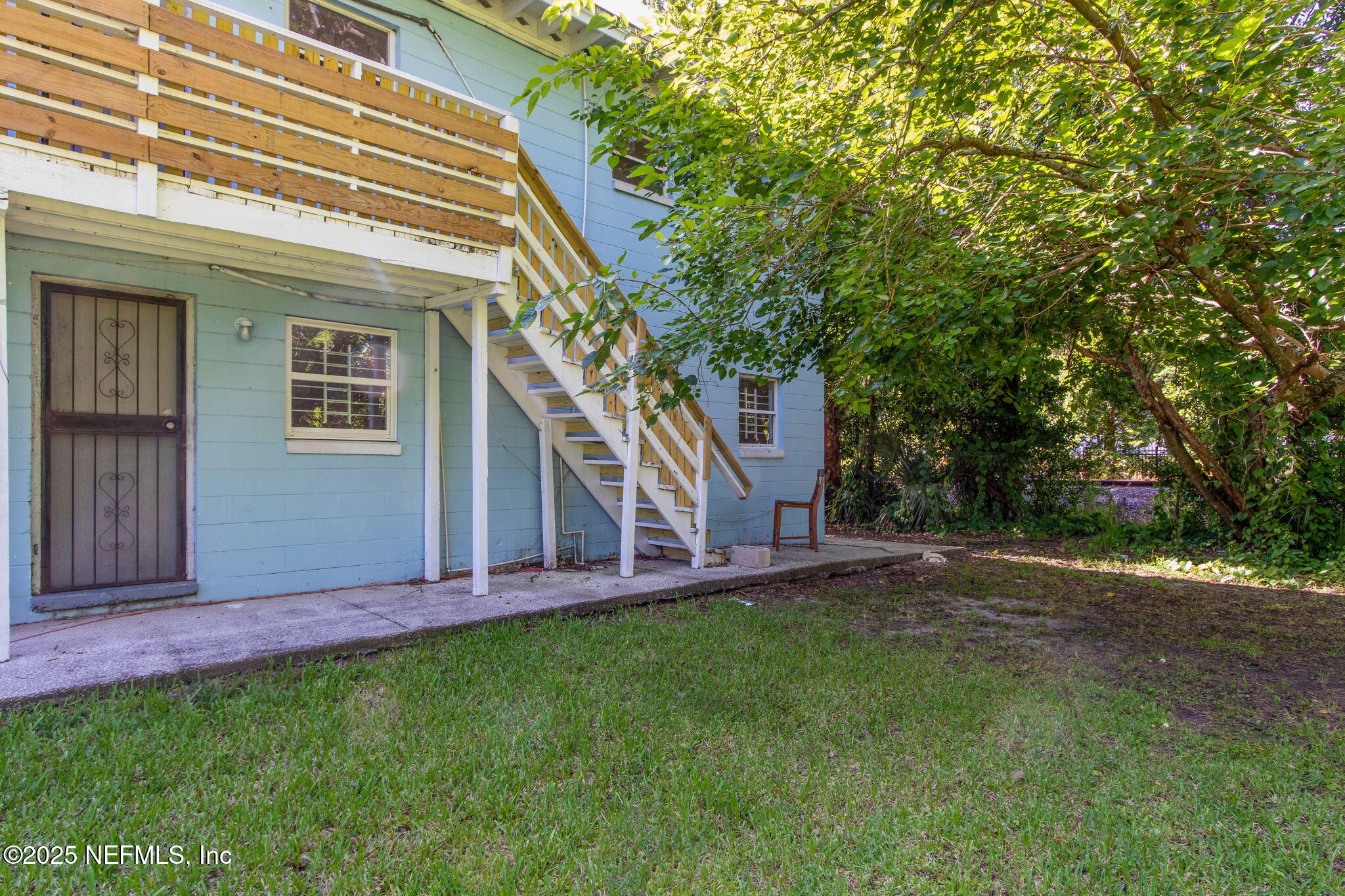 1224 West 18th Street, Unit 4 Jacksonville, FL 32209 - Photo 13 of 14 a view of a house with a backyard