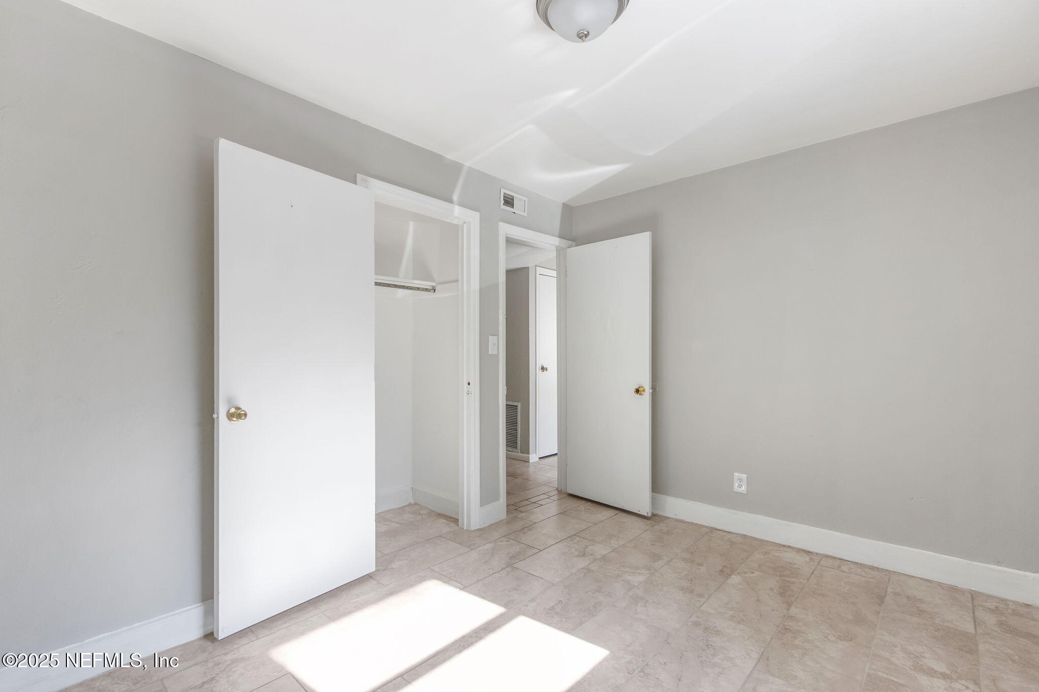 1224 West 18th Street, Unit 4 Jacksonville, FL 32209 - Photo 9 of 14 a view of an empty room