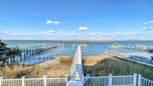 a view of a balcony with an ocean view