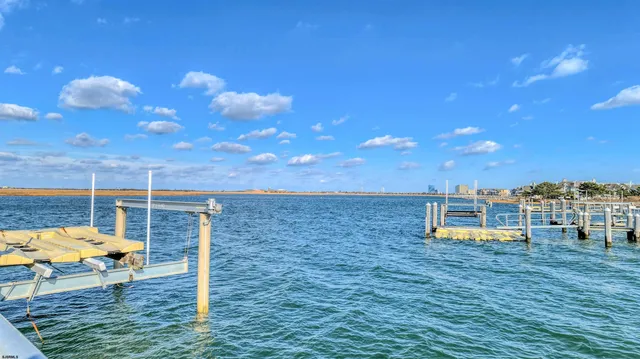 a terrace with a table and chairs