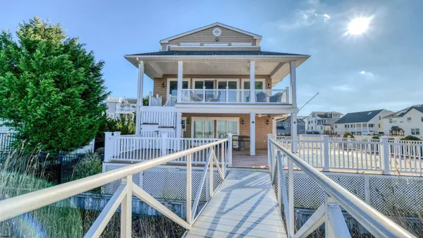 a view of houses with a street