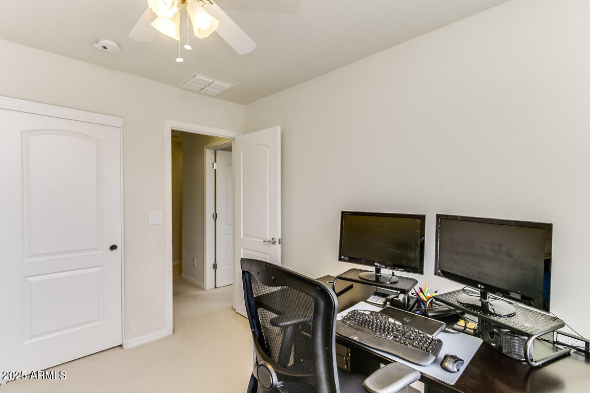 1827 West Black Hill Road Phoenix, AZ 85085 - Photo 32 of 49 a view of a workspace with furniture