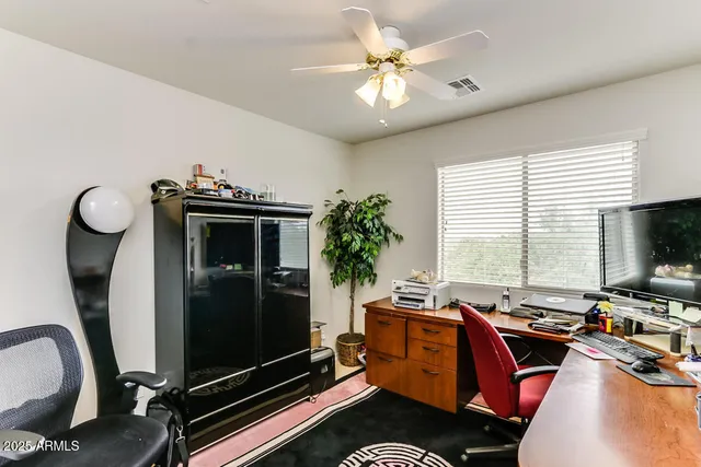 a view of a swimming pool with lounge chair