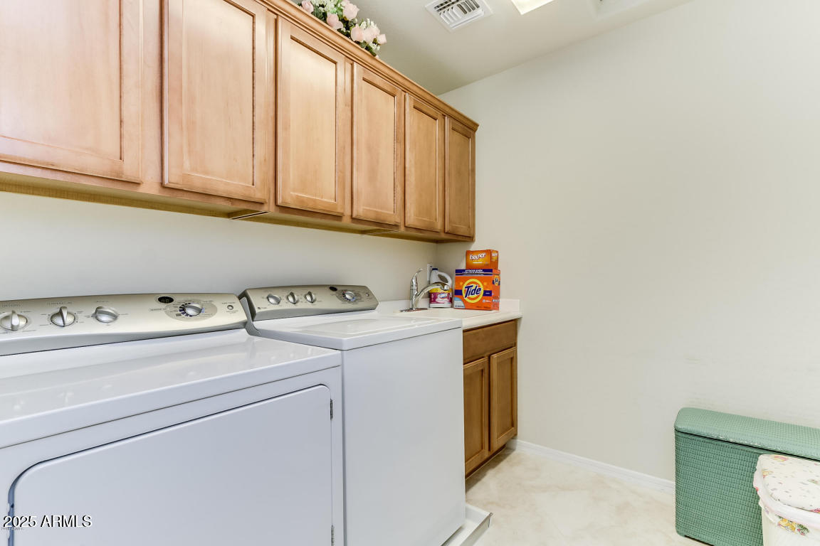 1827 West Black Hill Road Phoenix, AZ 85085 - Photo 39 of 49 a utility room with dryer and washer