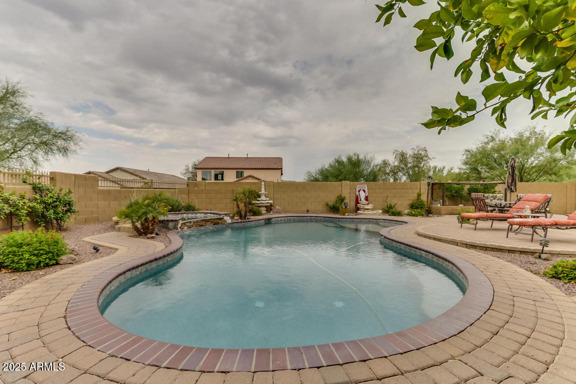 1827 West Black Hill Road Phoenix, AZ 85085 - Photo 41 of 49 a view of a swimming pool with lounge chair