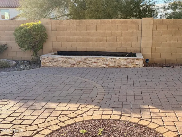 a bathroom with a shower and a sink