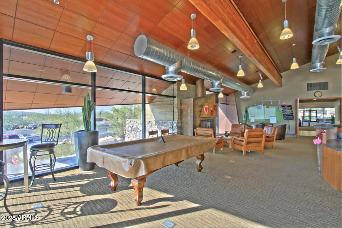 1827 West Black Hill Road Phoenix, AZ 85085 - Photo 46 of 49 a view of a patio with dining table and chairs