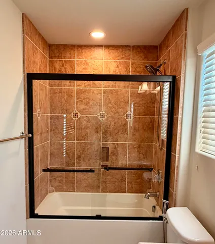 a view of a yard and front view of a house