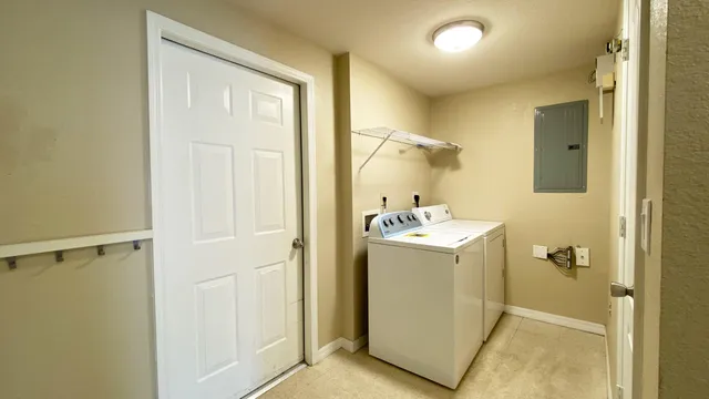 a utility room with a washer and dryer