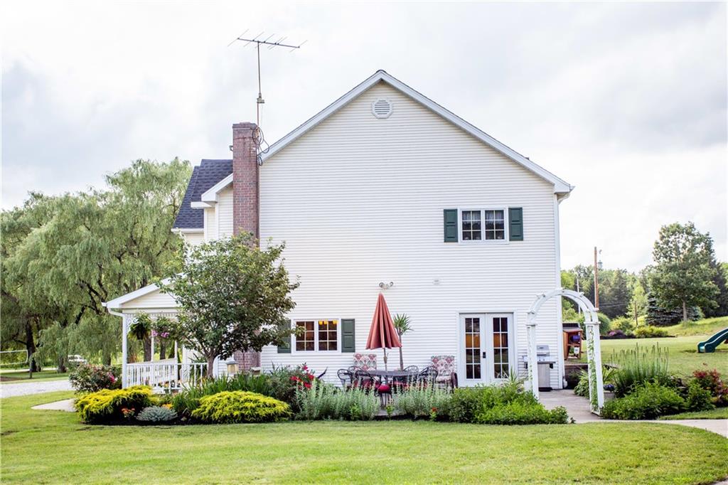 2844 Laurel Run Road Clymer, PA 15728 - Photo 5 of 25 a front view of a house with garden