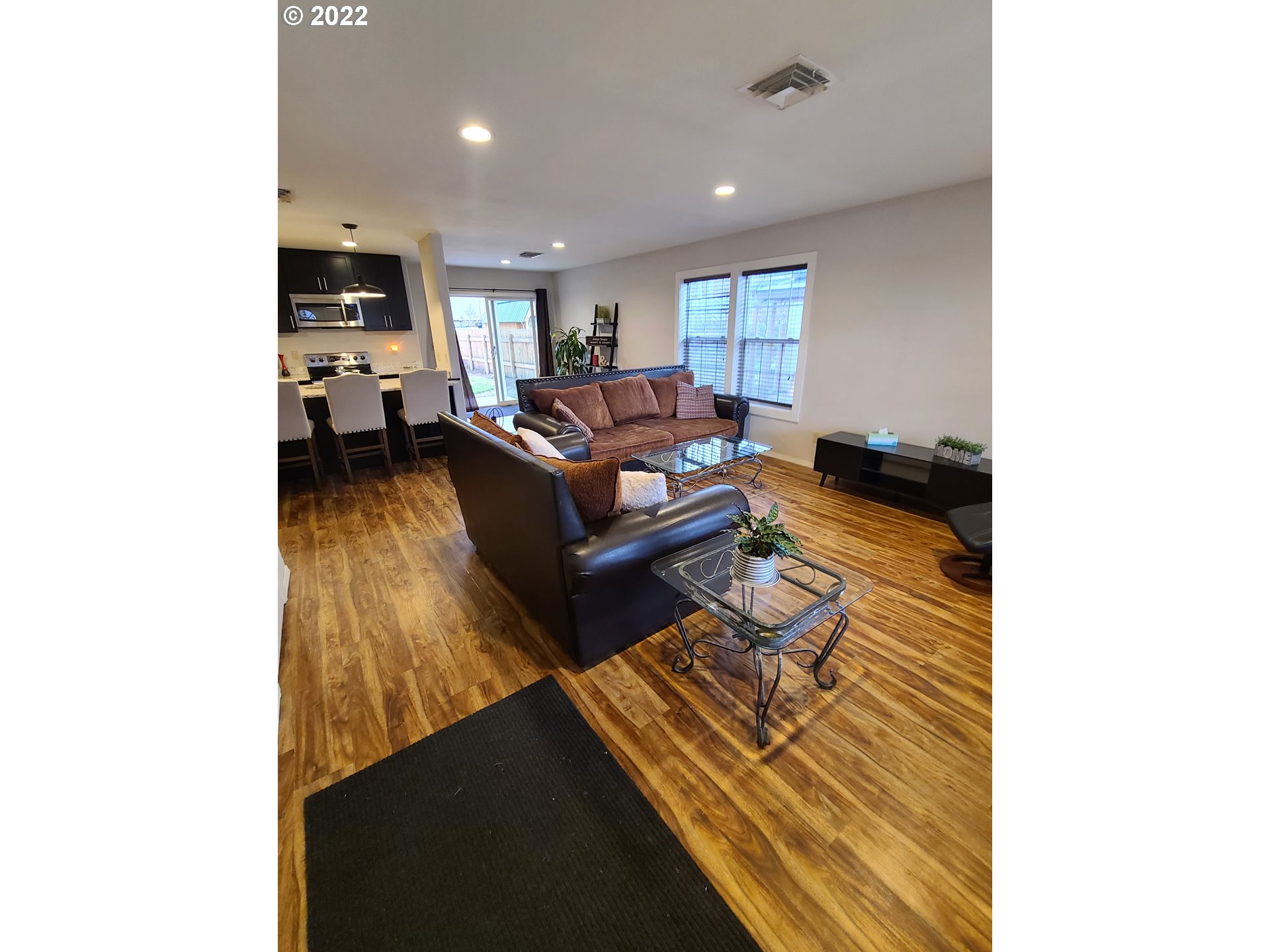 104 North College Street Joseph, OR 97846 - Photo 5 of 17 a living room with furniture and a couch