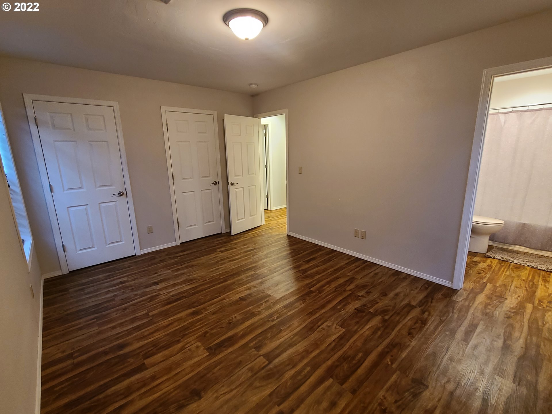 104 North College Street Joseph, OR 97846 - Photo 9 of 17 a view of a room with wooden floor and window