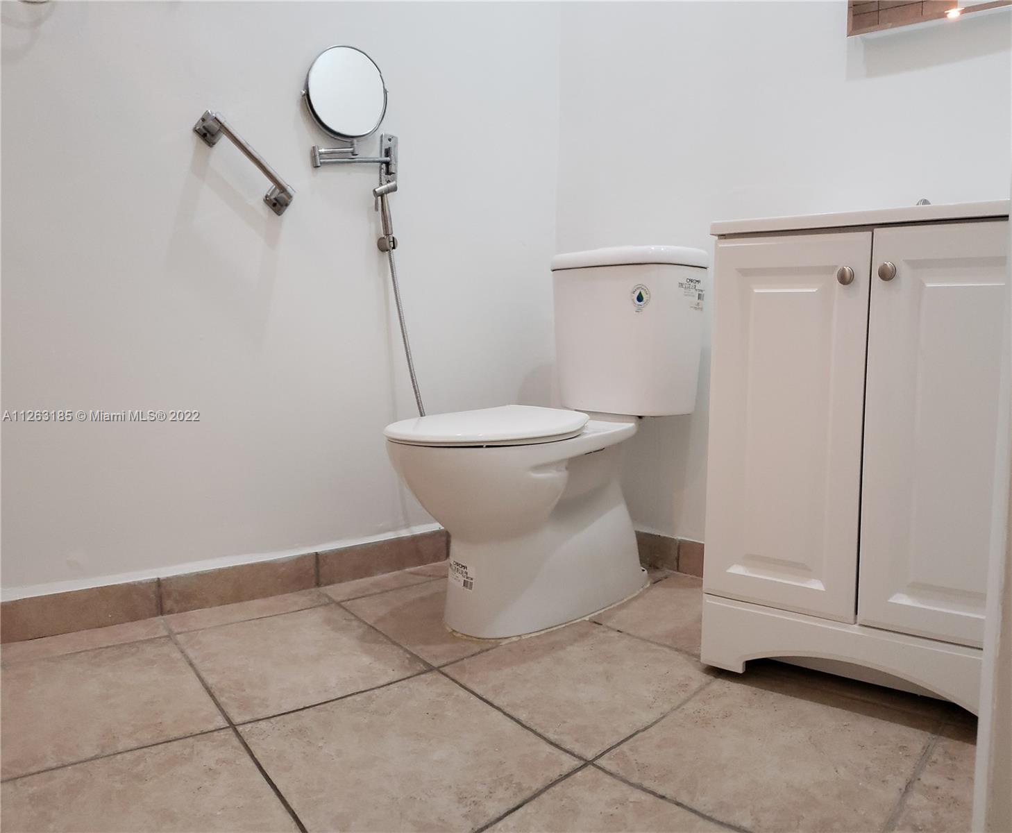 West Perrine Miami, FL 33157 - Photo 12 of 34 a white toilet sitting next to a shower